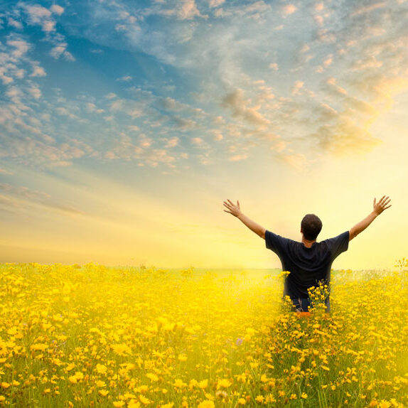 wholeself-blog-images-man-field-arms-up